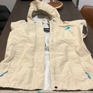 The North Face Rain Shell with hood and vented sleeves